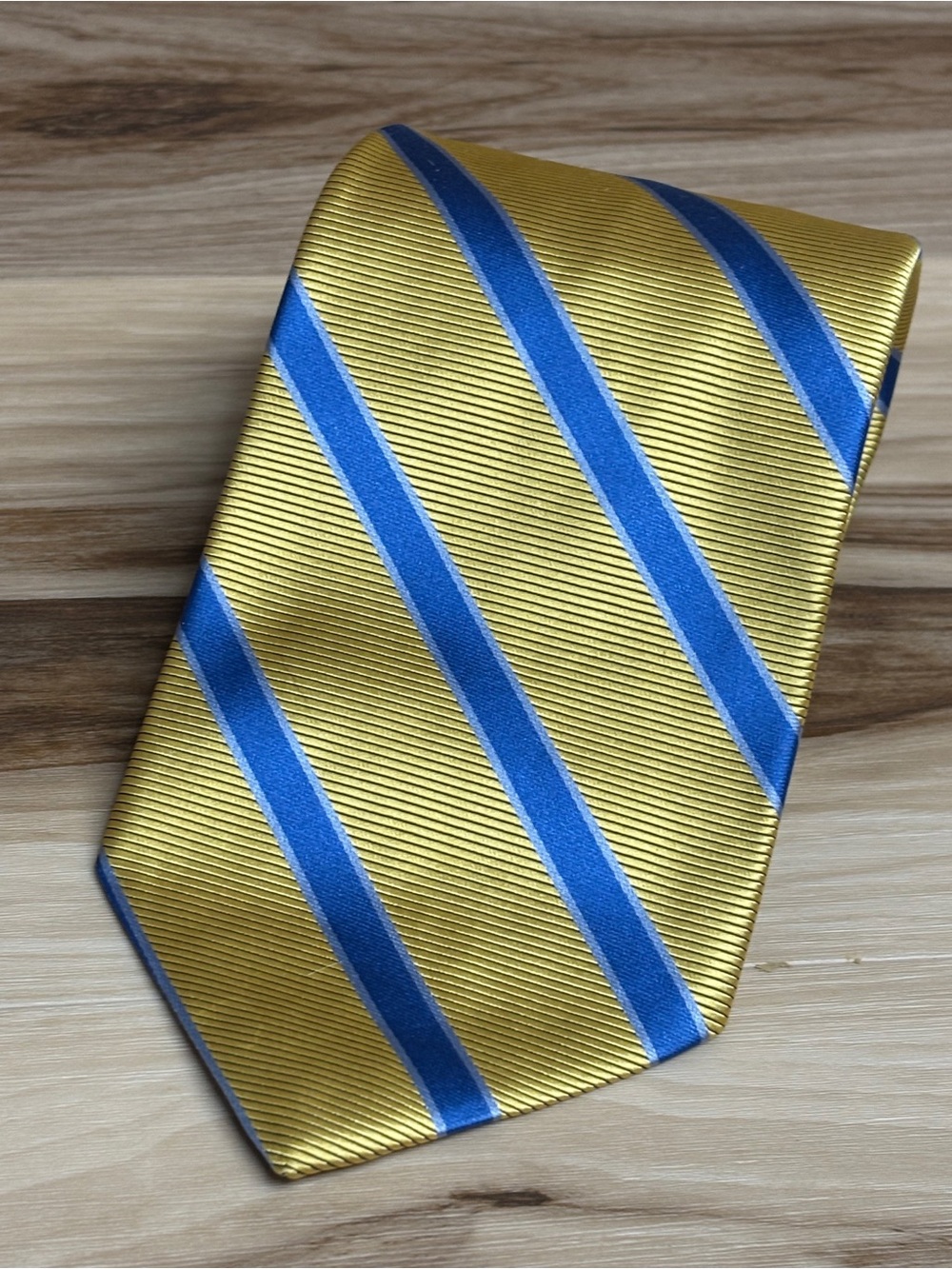 Brooks Brothers gold and blue stripes silk tie size 59” by 3.75”.